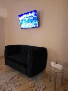 TV a/nebo společenská místnost v ubytování LK Apartamentos Amueblados