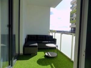 Posedenie v ubytovaní The Garden Apartment