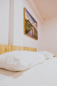 Een bed of bedden in een kamer bij Hotel Masam Isla Mujeres
