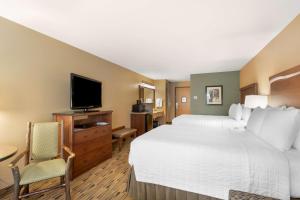 Postel nebo postele na pokoji v ubytování Best Western Plus Columbia River Inn