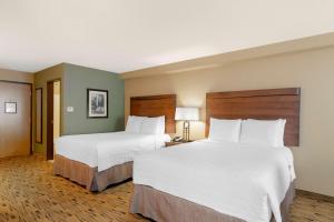 Postel nebo postele na pokoji v ubytování Best Western Plus Columbia River Inn