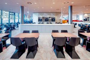 Ein Restaurant oder anderes Speiselokal in der Unterkunft Prize by Radisson, Vienna City 