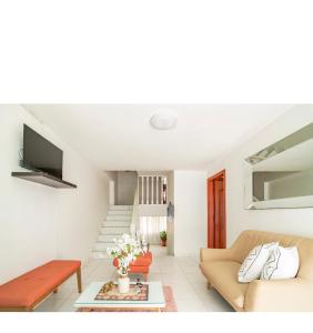 TV a/nebo společenská místnost v ubytování Apartamento karey 506