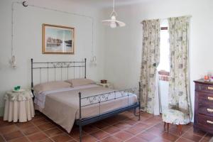 Posteľ alebo postele v izbe v ubytovaní B&B Il Giarolo + 13 fotografií