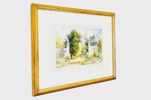 a picture of a framed painting of a garden at Entire home: Bicester Village 10min walk (650m) in Bicester