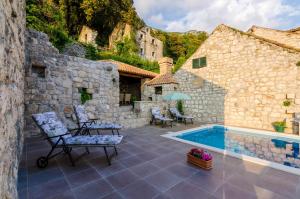 Kolam renang di atau dekat dengan Family friendly house with a swimming pool Mihanici, Dubrovnik - 15367