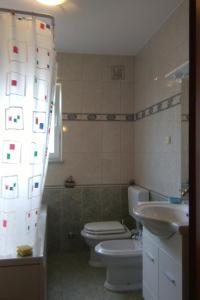 Koupelna v ubytování Apartments with parking spaces Flengi, Porec - 15395