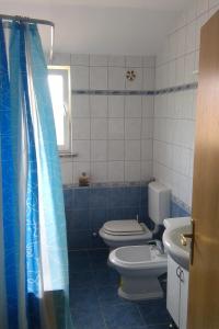 Koupelna v ubytování Apartments with parking spaces Flengi, Porec - 15395 + 7 fotografií