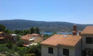 Fotografia z galérie ubytovania Apartments by the sea Cres - 15426 v Cresi