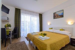 Posteľ alebo postele v izbe v ubytovaní Apartments with a parking space Trogir - 15440