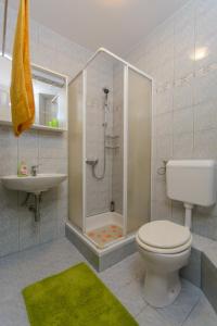 Koupelna v ubytování Apartments with a parking space Trogir - 15440