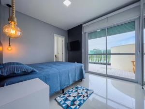 Cama o camas de una habitación en Costa Mexicana