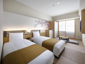 维拉芳泉羽田机场大酒店客房内的一张或多张床位