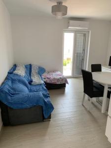 Posedenie v ubytovaní Family-friendly apartments with swimming pools Sutivan, Brac - 15665