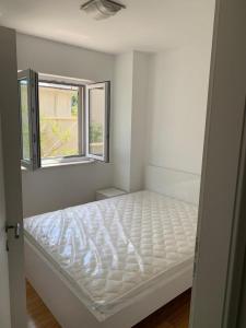 Posteľ alebo postele v izbe v ubytovaní Family-friendly apartments with swimming pools Sutivan, Brac - 15665