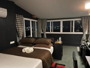 Ένα ή περισσότερα κρεβάτια σε δωμάτιο στο Gusto Accommodation