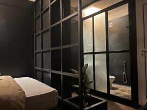 Ένα ή περισσότερα κρεβάτια σε δωμάτιο στο Gusto Accommodation