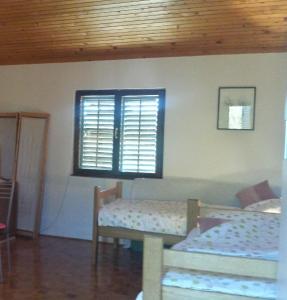 Posteľ alebo postele v izbe v ubytovaní Studio Ugljan 15613b