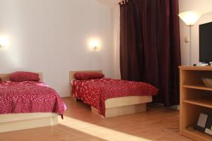 Ένα ή περισσότερα κρεβάτια σε δωμάτιο στο Apartments with parking space Brodarica, Sibenik - 15708