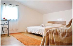 Posteľ alebo postele v izbe v ubytovaní Family friendly house with a swimming pool Posedarje, Novigrad - 15785 + 11 fotografií
