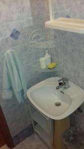 a bathroom with a sink and a shower at Apartments by the sea Crnja Luka, Korcula - 15978 in Blato