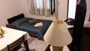 Postel nebo postele na pokoji v ubytování Apartments by the sea Crnja Luka, Korcula - 15978