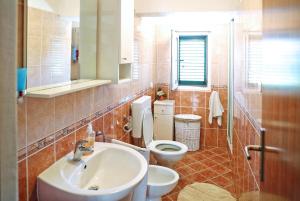 Koupelna v ubytování Seaside holiday house Sali, Dugi otok - 16128