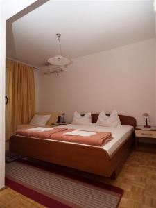 Ένα ή περισσότερα κρεβάτια σε δωμάτιο στο Studio Podaca 16114a