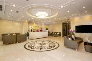 TV a/nebo společenská místnost v ubytování Roliva Hotel & Apartment Danang