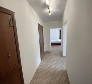 an empty hallway with a room with a bed at Complex Zolota Pidkova in Zolochiv