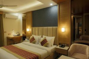 Katil atau katil-katil dalam bilik di Hotel Sakura by Maps