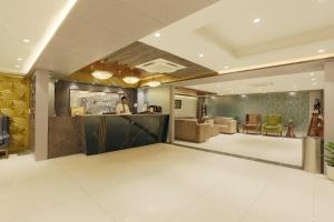 Ruang duduk di Hotel Sakura by Maps