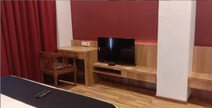 TV a/nebo společenská místnost v ubytování TGN SUITES - HOTEL