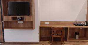 Kuchyň nebo kuchyňský kout v ubytování TGN SUITES - HOTEL