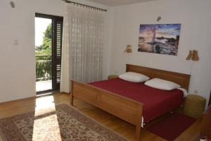 Posteľ alebo postele v izbe v ubytovaní Apartments by the sea Senj - 16279