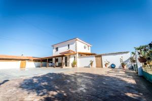 an image of a house with a driveway at Reel Paradise Villa, Cyprus in Larnaca