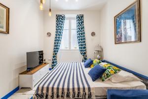 Posteľ alebo postele v izbe v ubytovaní Studio Travel 24M2, 120m Vieux-Port ,Clim , Wifi ,Accès autonome avec code