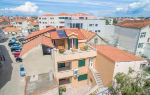 an aerial view of a house with an orange roof at Apartment Vodice 16249c in Vodice