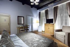 Letto o letti in una camera di Hotel Pod Věží