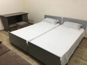Postel nebo postele na pokoji v ubytování Bonvenon capsule Hostel