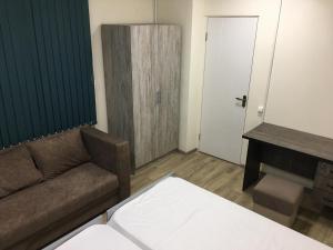 Postel nebo postele na pokoji v ubytování Bonvenon capsule Hostel