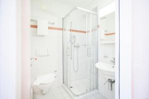 حمام في GUESTHOUSE ZURZACH - Self Check-in