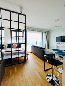 Tempat tidur susun dalam kamar di White Pearl Studio with parking in Holešovice