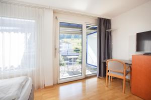تلفاز و/أو أجهزة ترفيهية في GUESTHOUSE ZURZACH - Self Check-in