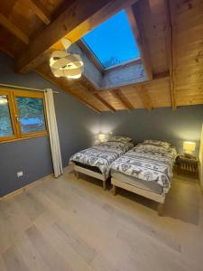 Postel nebo postele na pokoji v ubytování Chalet le Lotus Blanc