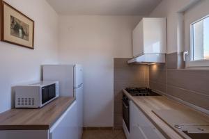 Fotografie z fotogalerie ubytování Spacious apartment with three double bedrooms v destinaci Stari Grad