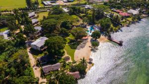 an aerial view of the resort and the water at MG Cocomo Resort Vanuatu in Port Vila