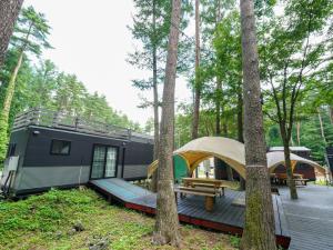Ein Garten an der Unterkunft 森と湖の楽園ＷorkshopＣampＲesort