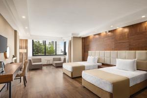 Postel nebo postele na pokoji v ubytování Ramada Plaza by Wyndham Samsun + 37 fotografií