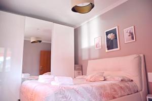 A bed or beds in a room at Appartamento “Casa Losa” Citra 008063-LT-0086